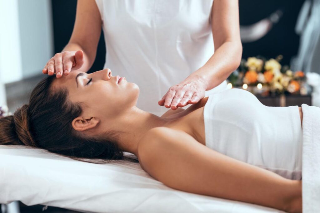 Professional Reiki practitioner performing an energy healing session